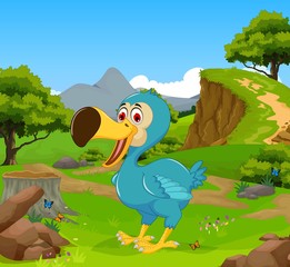 funny dodo bird cartoon in the jungle with landscape background © jihane37