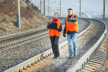Railroad workers maintaing railways