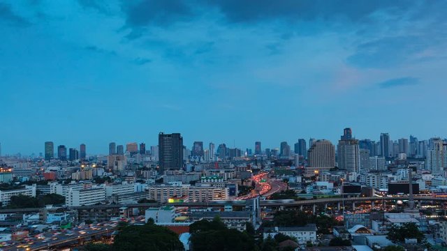 View of Business Building Bangkok city Asia Thailand. landscape area with transportation road and sky, day to night twilight. Transportation concept High quality in 4K Timelapse (3840 x 2160)