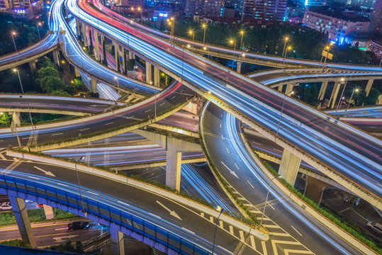 Aerial View of Shanghai overpass at Night in China. © fanjianhua