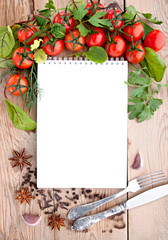 Tomatoes, garlic, parsley and spices on the wooden background with space for text. Top view.