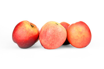 Nectarines on a white background