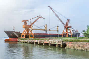 Fototapeta na wymiar Cargo container ship at harbor.