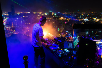 DJ - Party on top of building with music entertainment