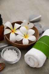 Composition of spa treatment on gray background