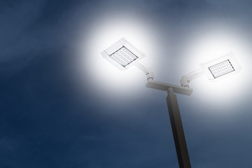 LED outdoor car park flood light working on night, saving energy.