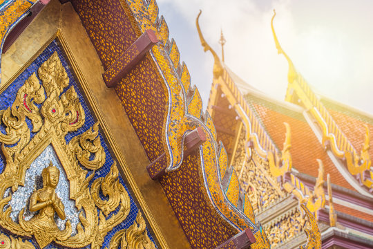 Thai temple, beautiful roof handcraft architecture of Wat Phra Kaew or the Temple of the Emerald Buddha or Wat Phra Sri Rattana Satsadaram, Bangkok Thailand.