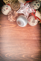 Christmas decorations on wooden background