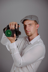 Young man using a professional camera