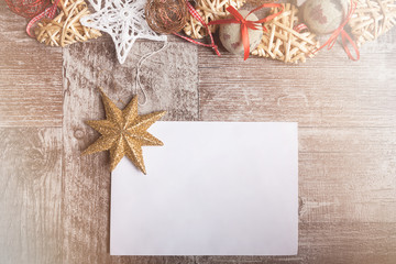 Christmas letter with ornaments arround it