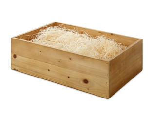 wooden box with wood shavings isolated on white