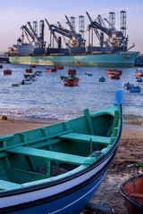 Fototapeta na wymiar Close up of a fishing boat on the beach of Trafaria, Portugal