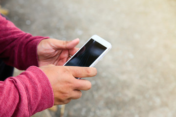 Photographer using mobile smart phone.