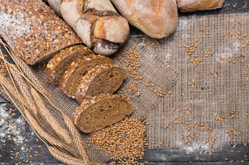 Bakery concept. Sliced rye bread background with copy space
