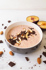 Plum chocolate almond smoothie bowl