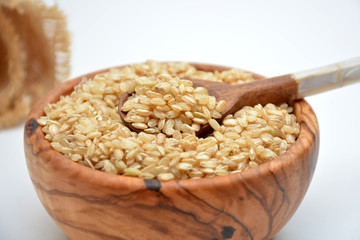 BOWL FULL OF RICE READY TO BE COOKED.