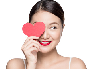 Cute attractive young woman with red heart. Valentine's day art