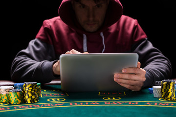 Online poker players sitting at the table