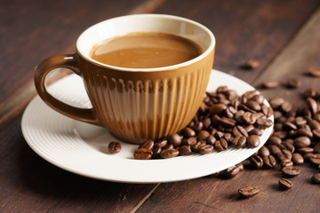 Coffee cup and coffee beans