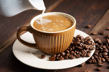 Coffee cup and coffee beans