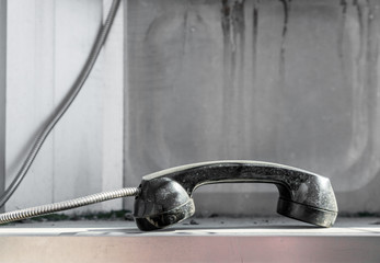 Dropped Public telephone handset