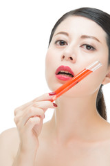 beauty asian woman red lips nail and holding chemistry tube