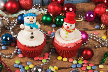 Christmas cupcakes with colored decorations