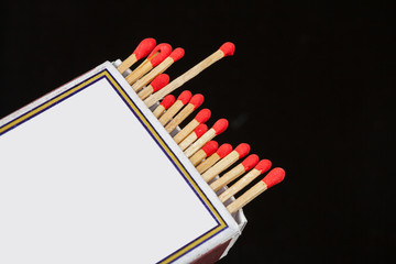 Matchsticks and box on isolated background