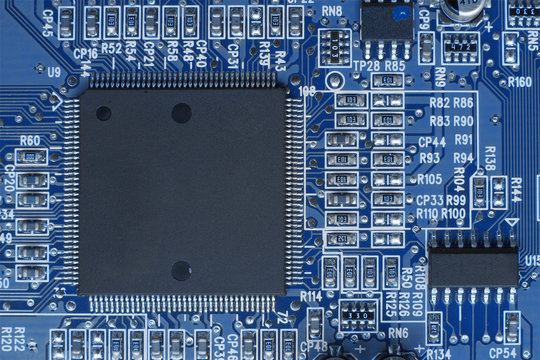 Printed circuit board with electronic components. Computer and technology concept. Toned image.