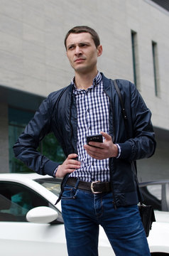Young man using his phone