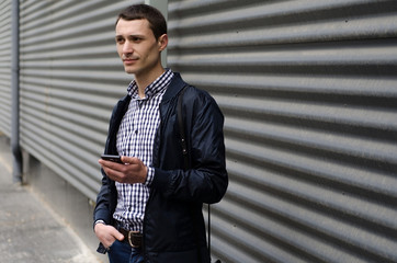 Young man using his phone