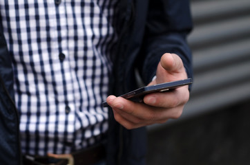 Young man using his phone