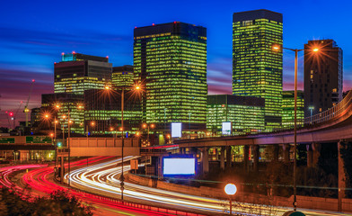 Fototapeta na wymiar Illuminated cityscape of Canary Wharf, a financial hub of London