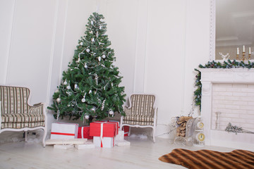 Christmas and New Year decorated interior room with presents and New year tree