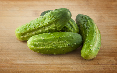 fresh cucumbers on the cutting table