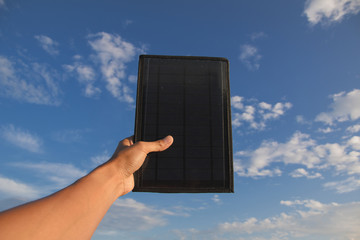 solar panel ten watt and solar panel at solar farm with blue sky at sunrise
