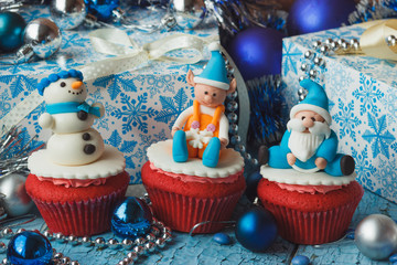 Christmas cupcakes with colored decorations