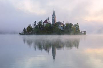Fototapeta na wymiar Amazing sunrise at the lake Bled in autumn, Slovenia