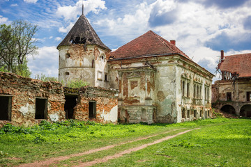 Fototapeta na wymiar Pomoriany Castle, a ruined castle in the village of Pomoriany, U