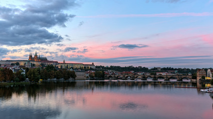 Naklejka na ściany i meble The view from the river Vltava at Charles Bridge and Prague Castle