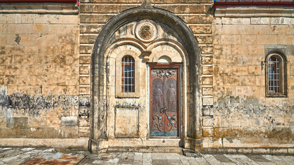 Fototapeta na wymiar Close up view of the Motsameta Monastery gates in Georgia