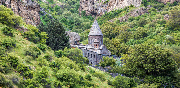 Old UNESCO object Geghard monastyr - Armenia summer day. Exploring Armenia