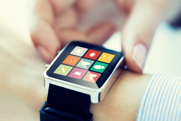 close up of hands setting smart watch application