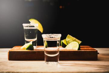 Tequila shot with fresh lime slice and salt.