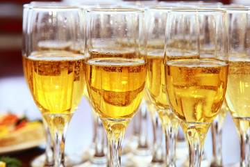 champagne in the glasses on the table