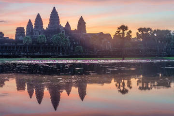 Fototapeta na wymiar Angkor Wat with reflection during sunrise time