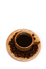 Small white cup of coffee. Isolated white background