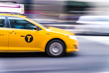 Plakat NYC taxi in motion. Blurred, long exposure images.
