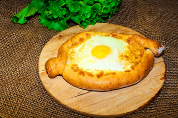 Adjara khachapuri bread with cheese and egg