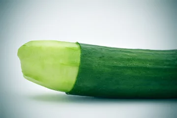 Foto op Plexiglas cucumber with the skin of its tip removed © nito
